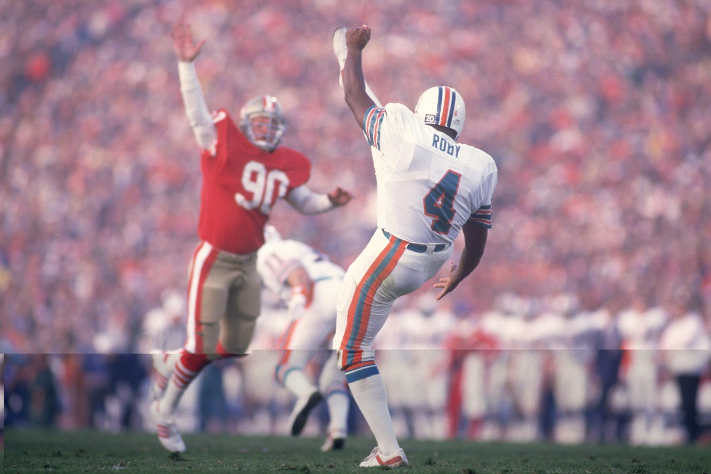 Reggie Roby was a very successful punter for the Miami Dolphins and broke down color barriers in the NFL. He, however, sadly died too young.