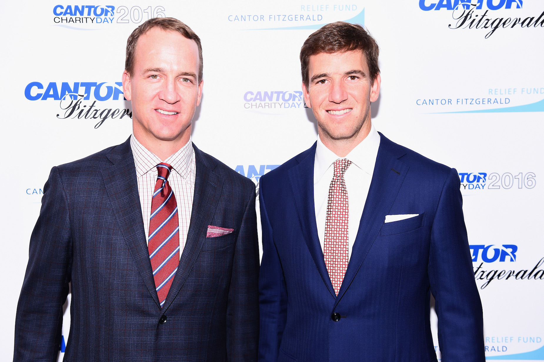 What is Eli Manning's net worth and how does it compare to Peyton Manning's?