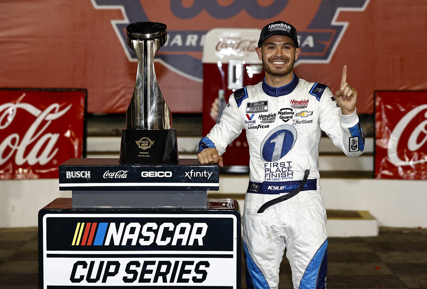 Kyle Larson, driver of the Hendricks Motorsports No. 5 Chevrolet, celebrates in victory lane after winning the NASCAR Cup Series Coca-Cola 600,