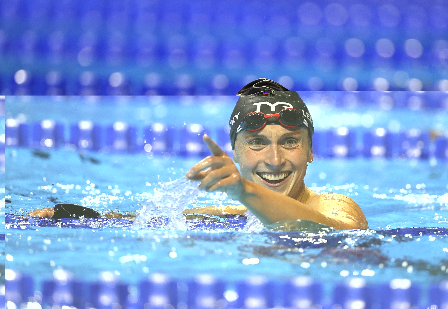 Katie Ledecky reacts after competing in the women’s 800-meter freestyle final during the U.S. Olympic Trials.