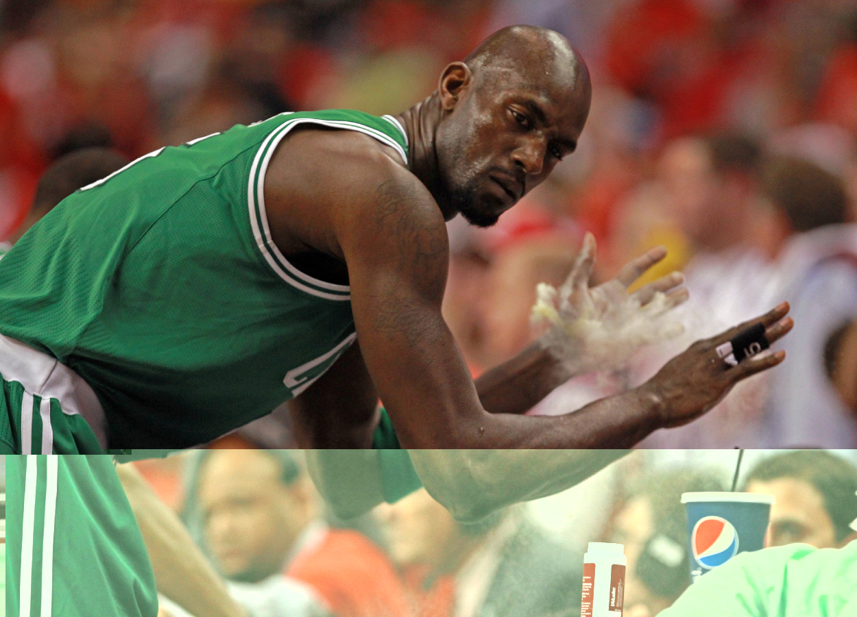Boston Celtics power forward Kevin Garnett powders his hands.