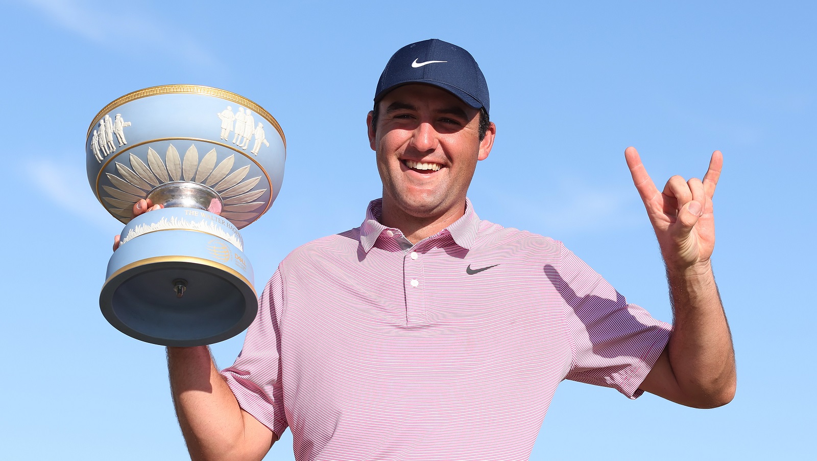 Scottie Scheffler poses with the Walter Hagen Cup after defeating Kevin Kisner in their finals match to win the World Golf Championships-Dell Technologies Match Play at Austin Country Club on March 27, 2022. | Gregory Shamus/Getty Images
