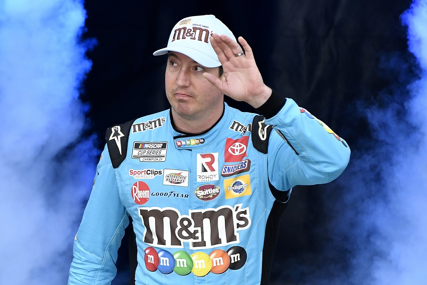 Kyle Busch waves to fans during driver intros prior to the NASCAR Cup Series Food City Dirt Race at Bristol Motor Speedway on April 17, 2022.