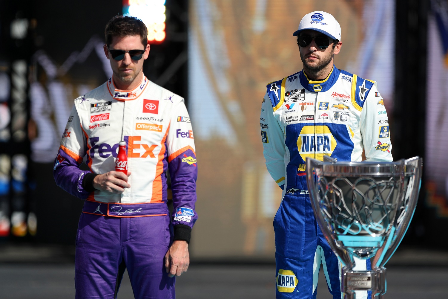 NASCAR Cup Series Championship 4 drivers Denny Hamlin and Chase Elliott during pre-race ceremonies at the NASCAR Cup Series Championship at Phoenix Raceway on Nov. 7, 2021. | Meg Oliphant/Getty Images