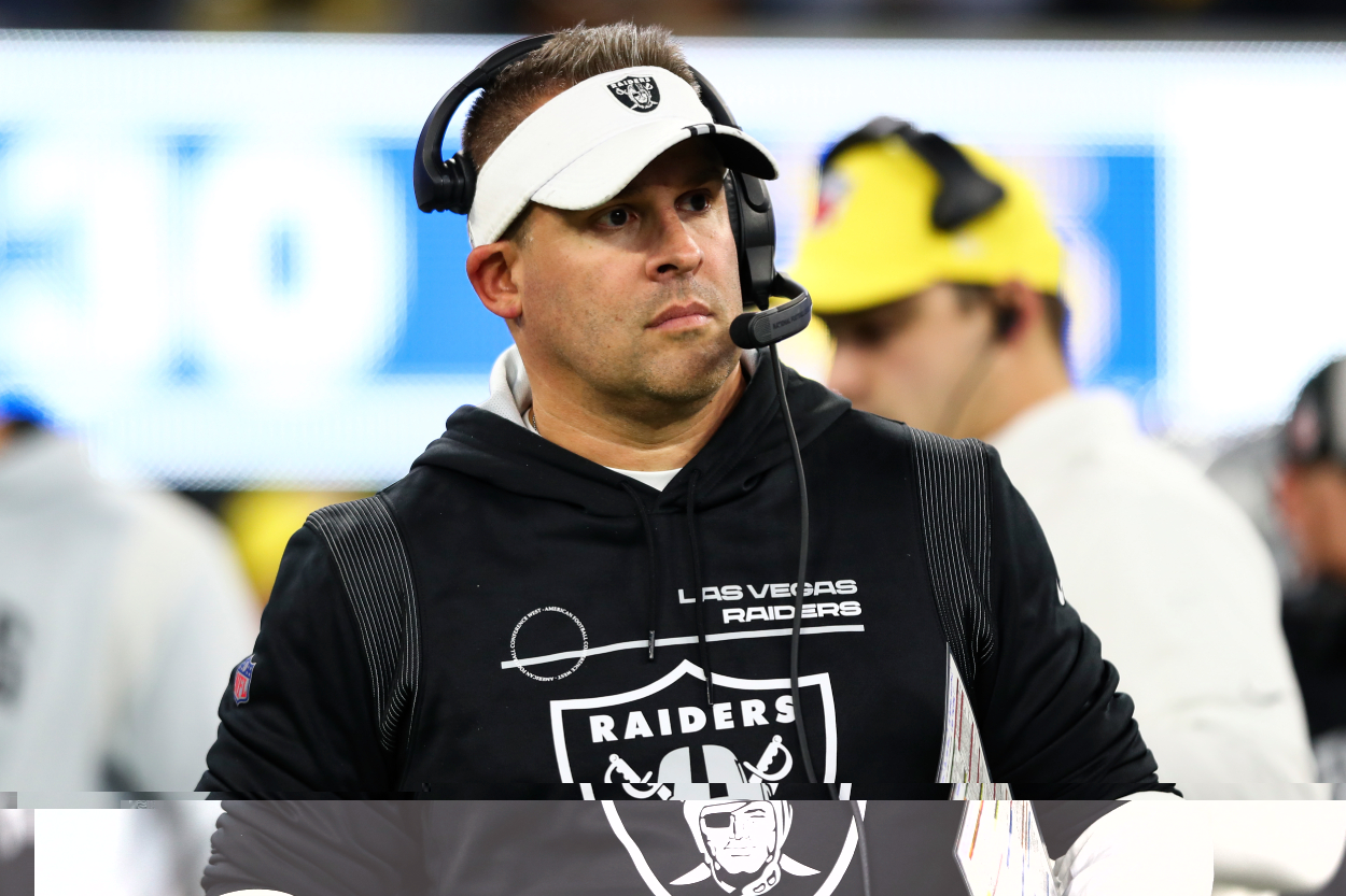 Head coach Josh McDaniels of the Las Vegas Raiders stands on the sidelines.