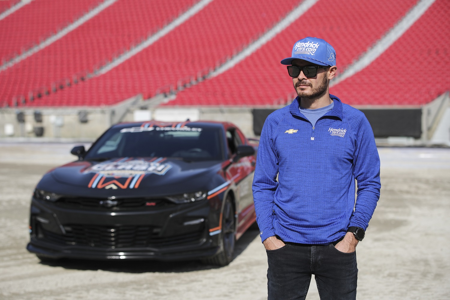 Kyle Larson arrives for the groundbreaking ceremony ahead of the Busch Light Clash at The Los Angeles Memorial Coliseum on Dec. 15, 2022.