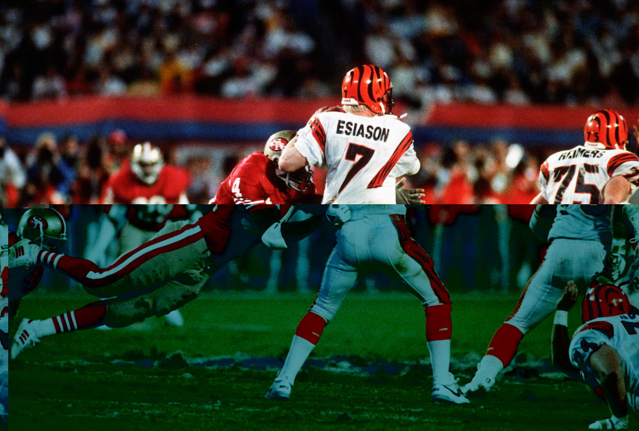 Boomer Esiason of the Cincinnati Bengals looks to get a pass off.