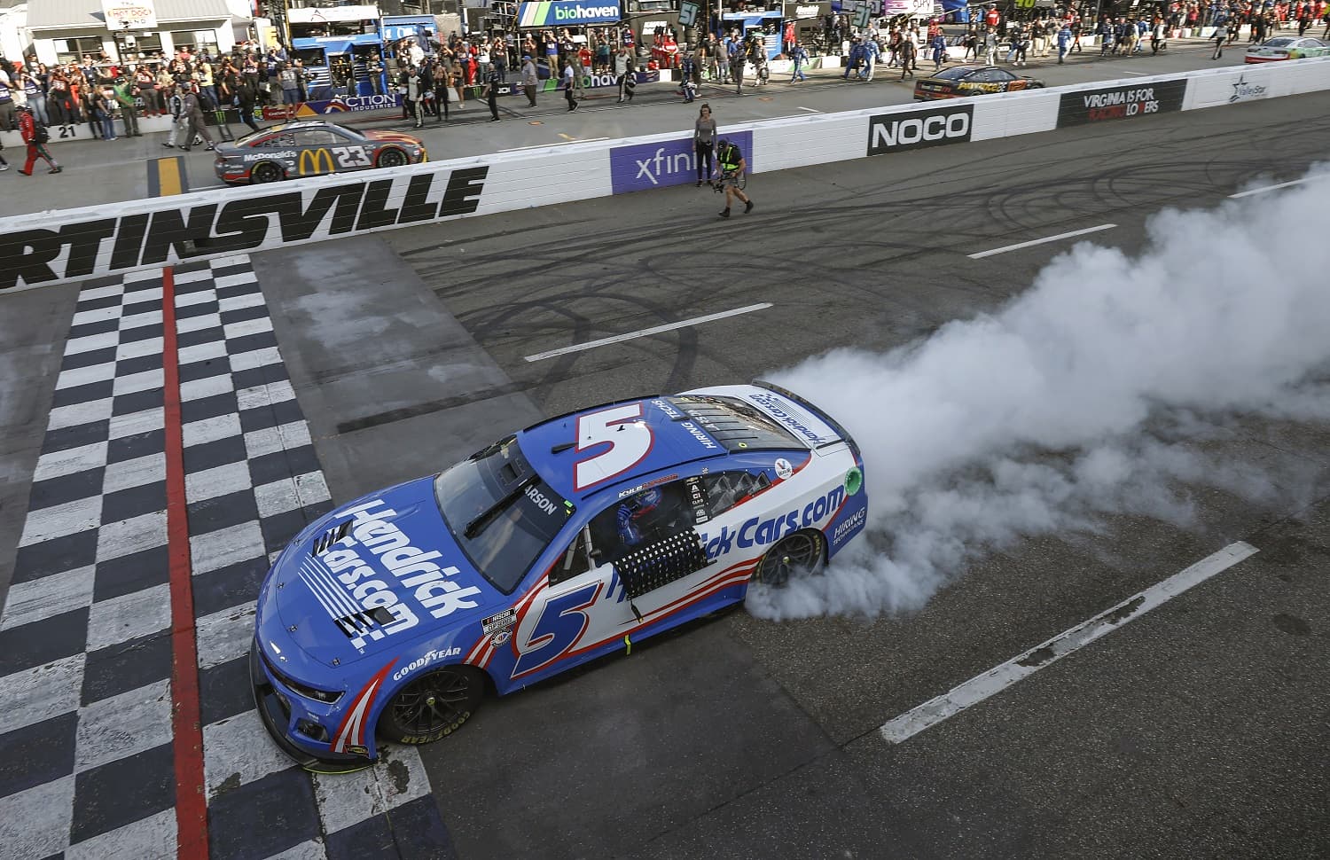 Kyle Larson celebrates with a burnout after winning the NASCAR Cup Series NOCO 400 at Martinsville Speedway on April 16, 2023. | Jared C. Tilton/Getty Images