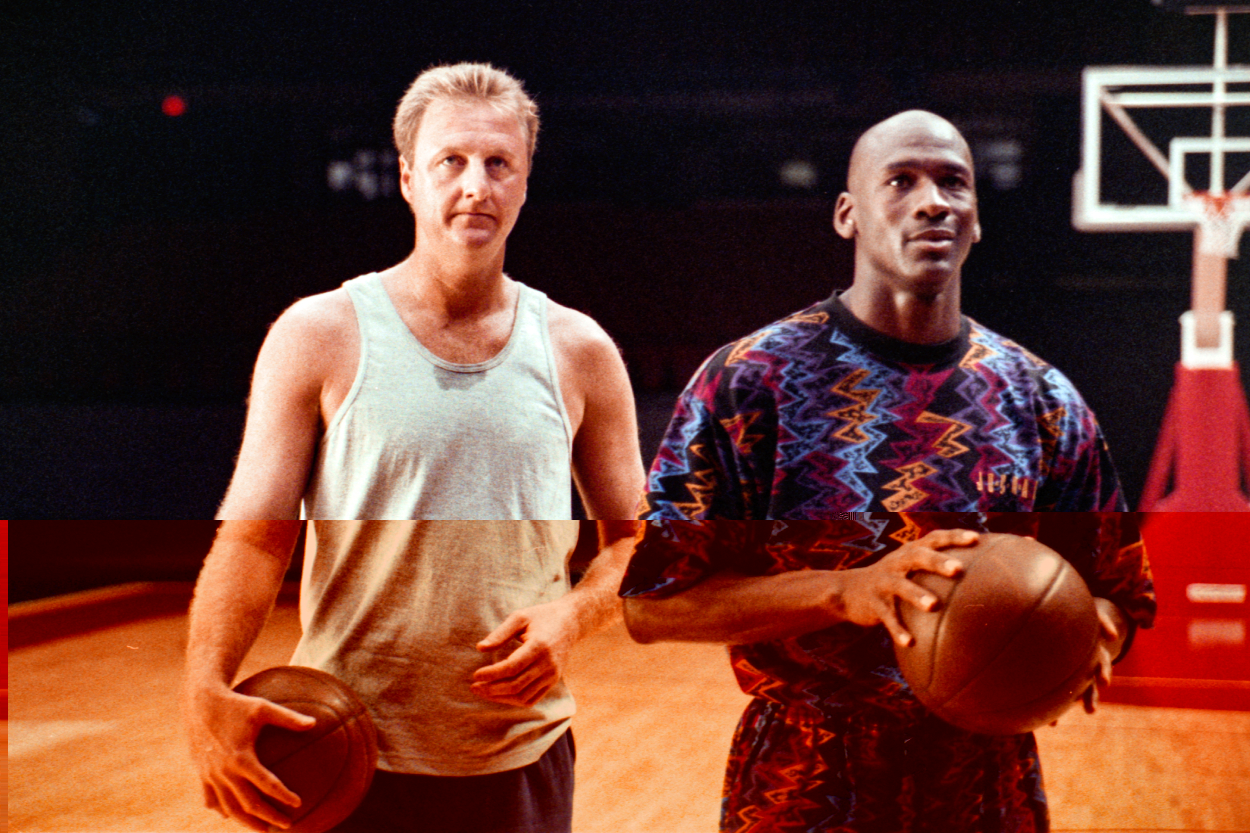 Larry Bird and Michael Jordan stand by to be filmed for a McDonald's "Nothing But Net" television commercial.